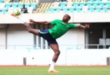 Victor Osimhen tries to control the ball during a Super Eagles training session